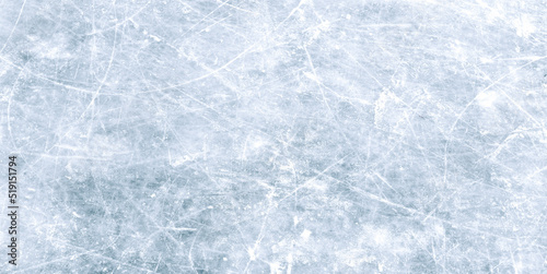 Natural scratched ice at the ice rink as texture or background for winter composition, large long picture photo