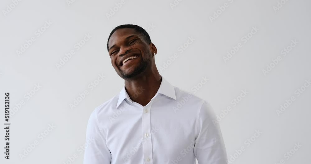 Happy African American businessman laughing over white background Happy African American businessman laughing over white background