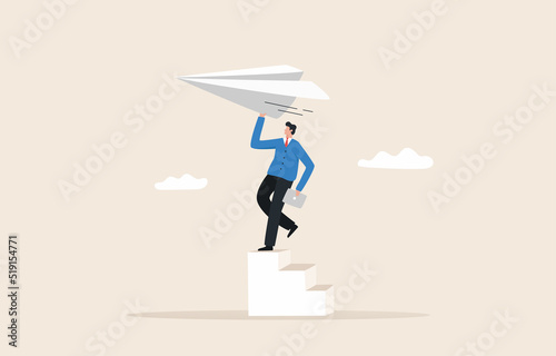 Starting a new job. .Starting a career path. pass on creativity and inspiration. eagerness to succeed. Businessman running  to launch big paper airplane.