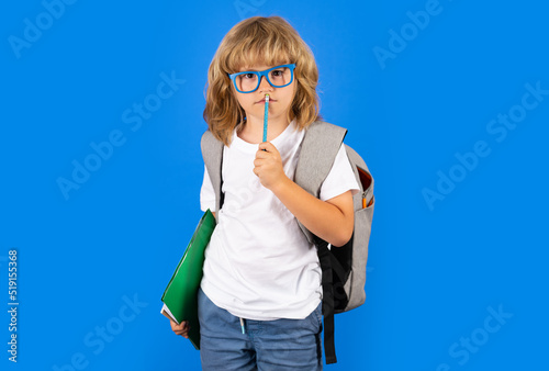 Thinking pensive pupil, thoughtful emotions of school child, clever smart funny nerd have idea. School little student hold books. Kids education concept. Child in school uniform.