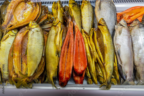 Salted fish and cold smoked fish on counter in store