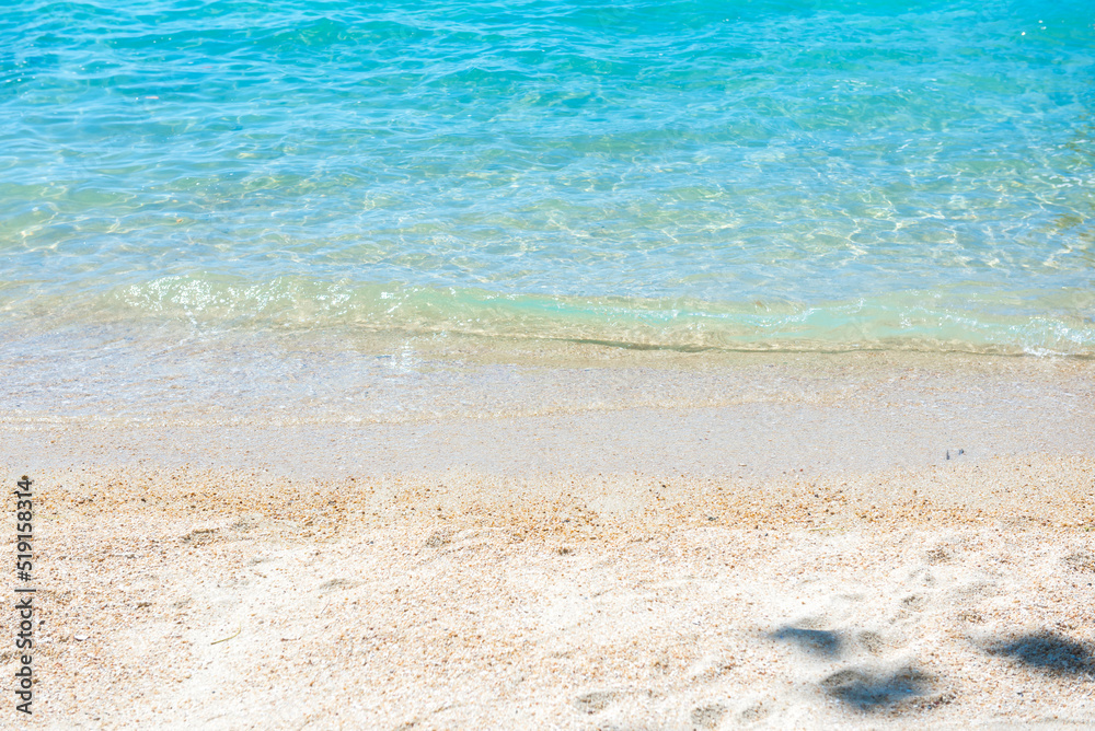Summer beach background. Top view of white sand with tropical sea. Summer beach background. Top view of white sand with tropical sea.