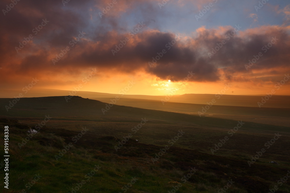 Dramatic Lighting over the Pennine Hills at Sunset, North Yorkshire, UK England. Dramatic Lighting over the Pennine Hills at Sunset, North Yorkshire, UK England.