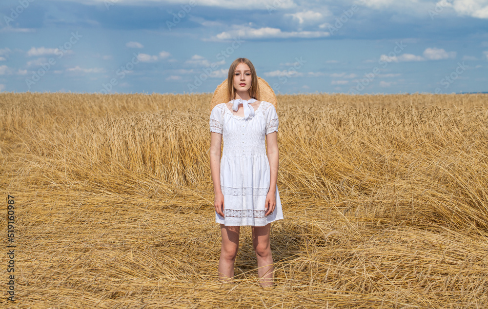 Young blonde model in wheat field Young blonde model in wheat field