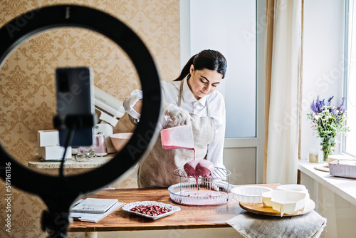 Side Hustle Ideas to Make Money, Culinary online courses. Asian Arabic woman pastry chef photo