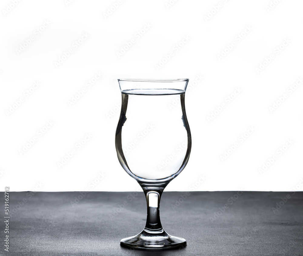 Obraz premium The image of pouring drinking water, into a glass,