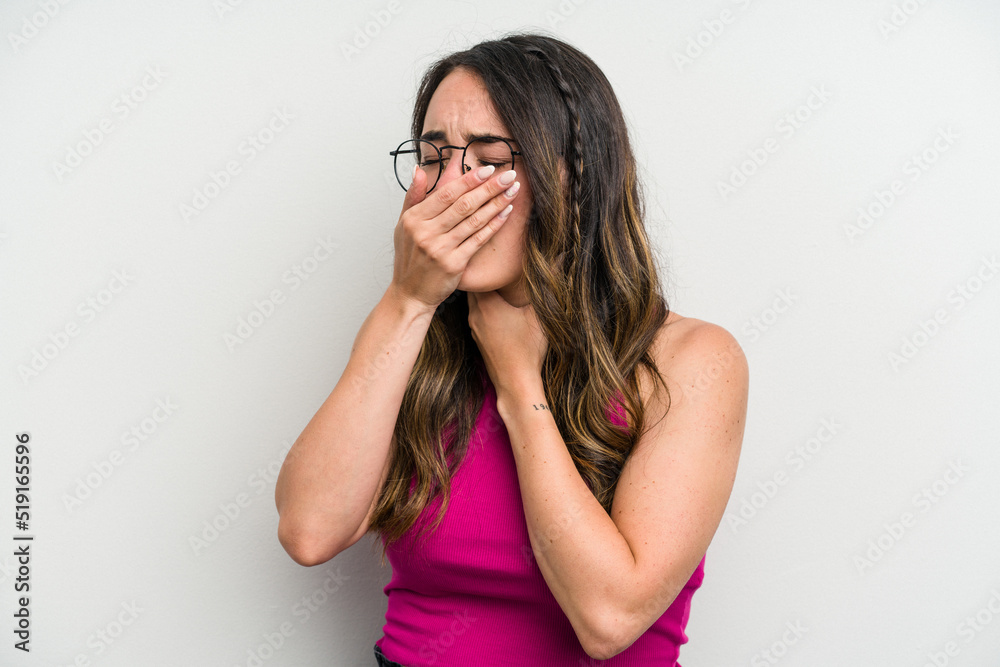 Young caucasian woman isolated on white background suffers pain in throat due a virus or infection. Young caucasian woman isolated on white background suffers pain in throat due a virus or infection.