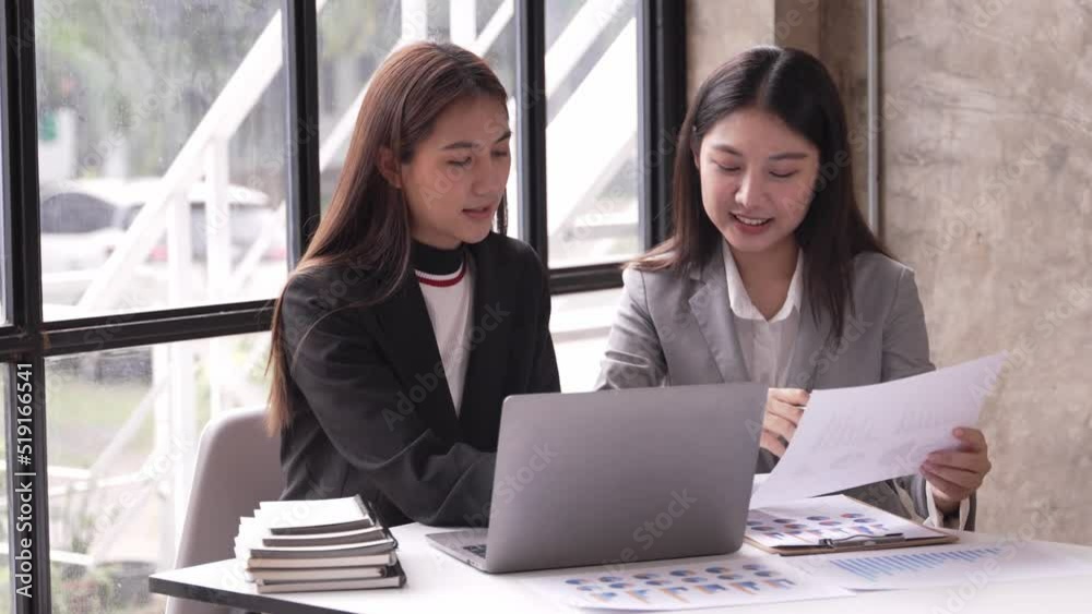 Young colleagues having great business conversations in a modern coworking office. Teamwork concept. Horizontal blurry background. Fireworks.