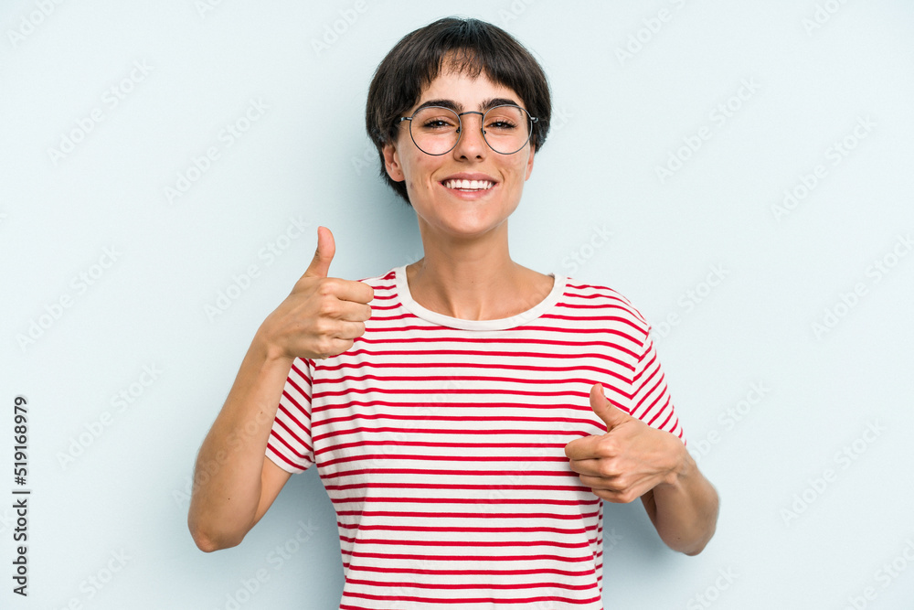 Young caucasian woman with a short hair cut isolated raising both thumbs up, smiling and confident. Young caucasian woman with a short hair cut isolated raising both thumbs up, smiling and confident.