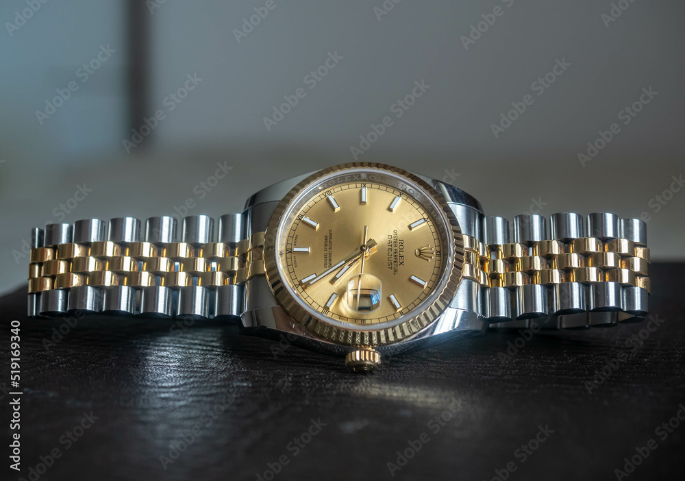 Rolex datejust, gold dial and two tone gold strap, most famous model of