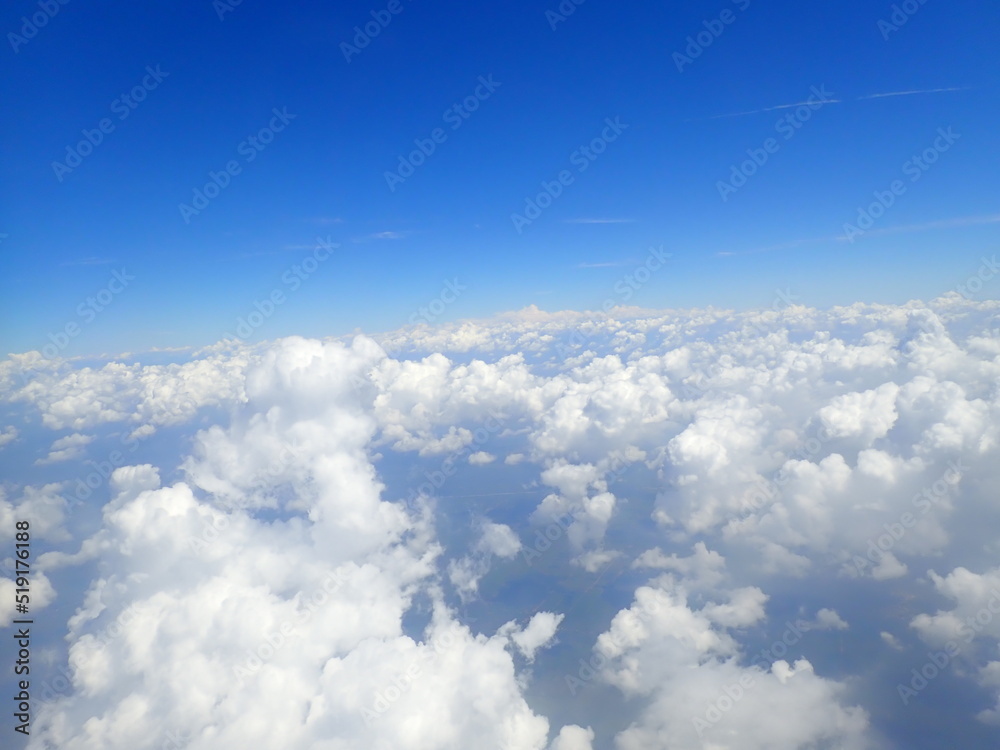 beautiful view over the cloud and blue sky from air plane window beautiful view over the cloud and blue sky from air plane window