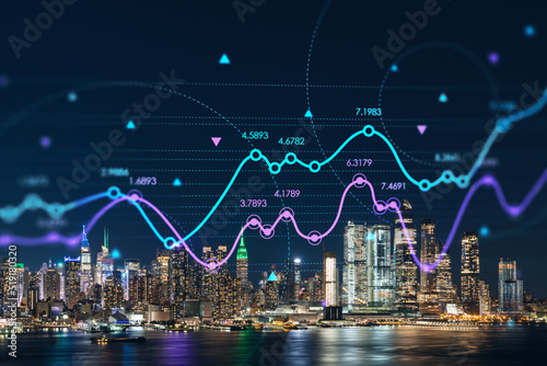 New York City skyline from New Jersey over the Hudson River with Hudson Yards at night. Manhattan  Midtown. Forex candlestick graph hologram. The concept of internet trading  brokerage  analysis
