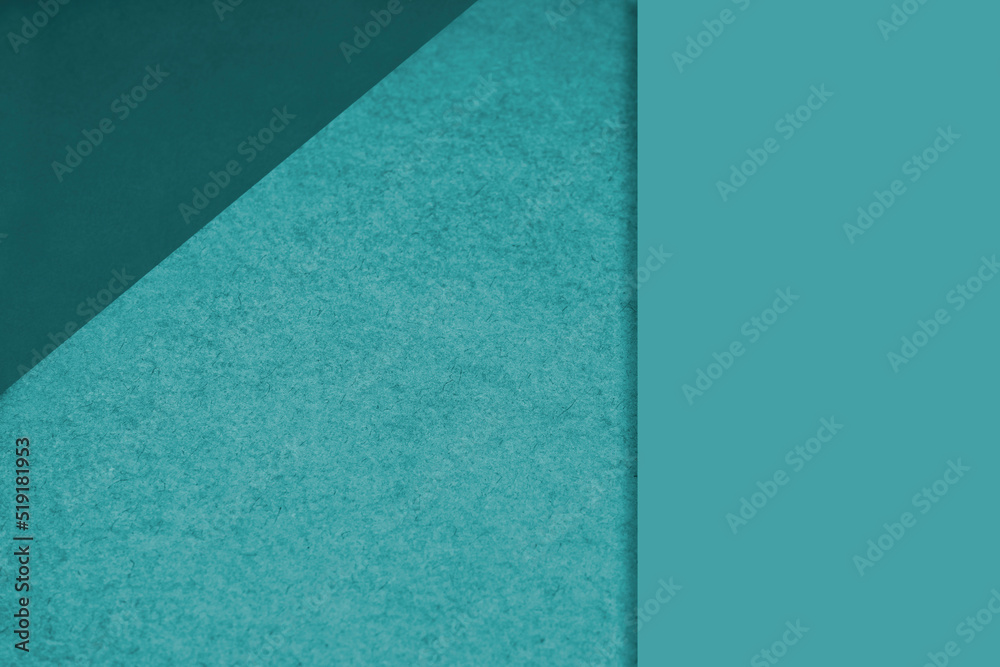 Textured and plain ocean blue sheet papers forming two triangles and vertical blank rectangle for creative cover designing