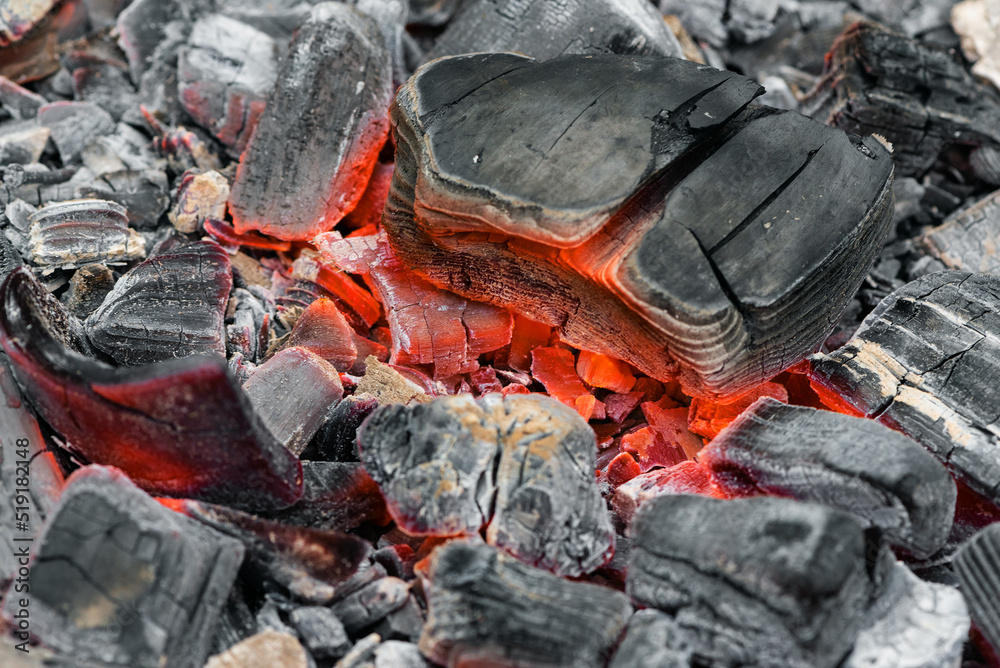 Burning coals texture background close up. Burning coals texture background close up.