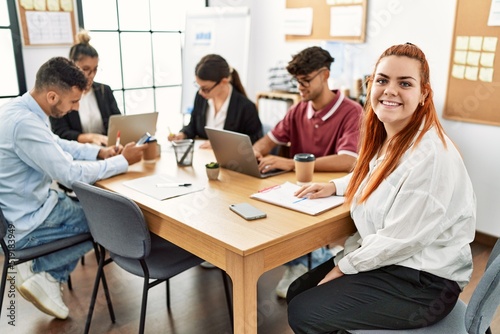 Group of business workers smiling happy working at the office