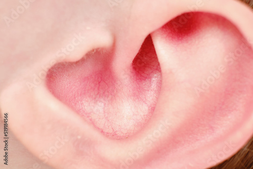 Close-up of baby ear age one year, macro photo of the child head
