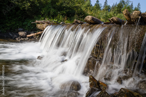 waterfall in the mountains in summer © Андрій Лучишин