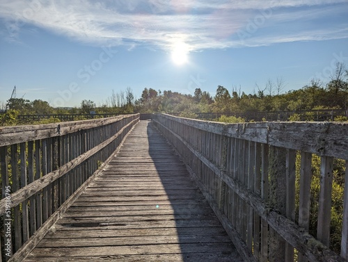 wooden bridge over the river © Karen