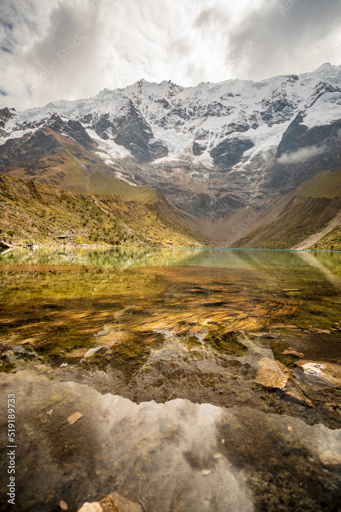 The lagoon is located near the Salkantay snow-capped mountain in the Andes Mountains of Cusco, Peru The lagoon is located near the Salkantay snow-capped mountain in the Andes Mountains of Cusco, Peru