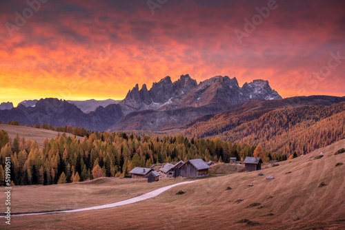 Obraz na plátně Incredible red sunset at Fuchiade valley in Italian Dolomites countryside
