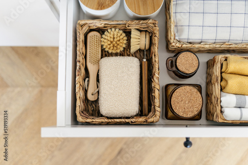 Zero waste products inside organization boxes on kitchen photo