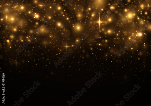 Festive golden luminous background with colorful lights bokeh. Christmas concept. Glitter bokeh effect.