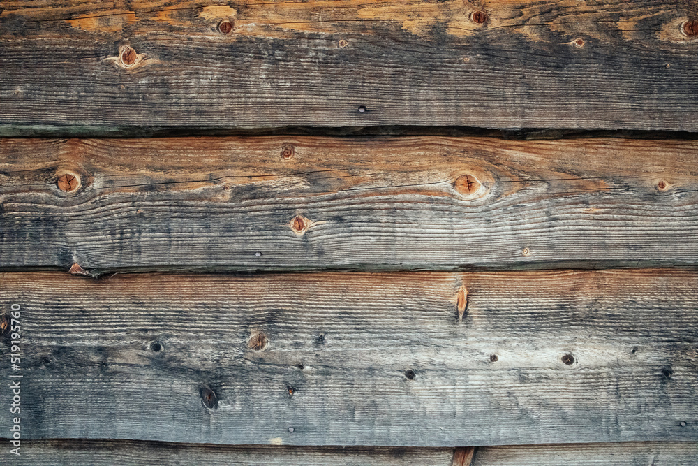 Wooden boards background. Wood texture in brown and gray Wooden boards background. Wood texture in brown and gray