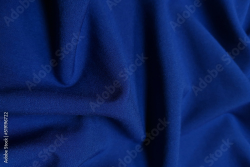 Blue galliano fabric crumpled or wavy fabric texture background. Abstract linen cloth soft waves. Viscose yarn. Smooth elegant luxury cloth texture. Concept for banner or advertisement. photo