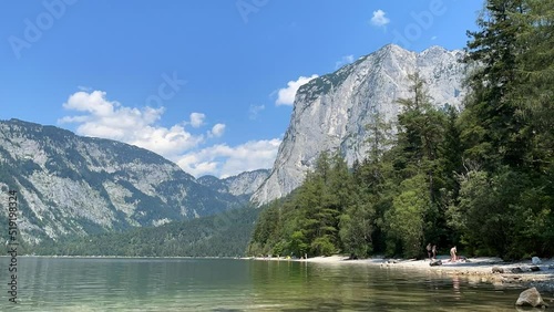 Time-lapse view over an Altausseersee to a summit Tressenstein. photo