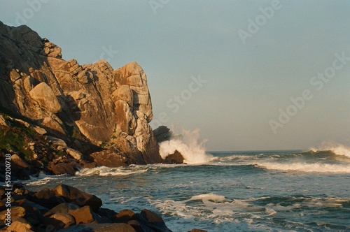 waves crashing on rocks