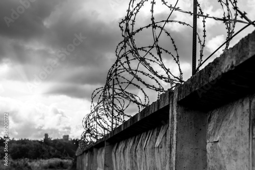 Prison. Prison wall with barbed wire. Law and justice photo