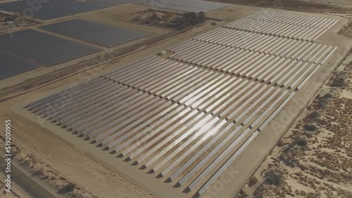 Aerial view of solar panels in the Arabian desert. Saudi Arabia launches production at Sakaka solar power plant with a capacity of 300 MW. photo