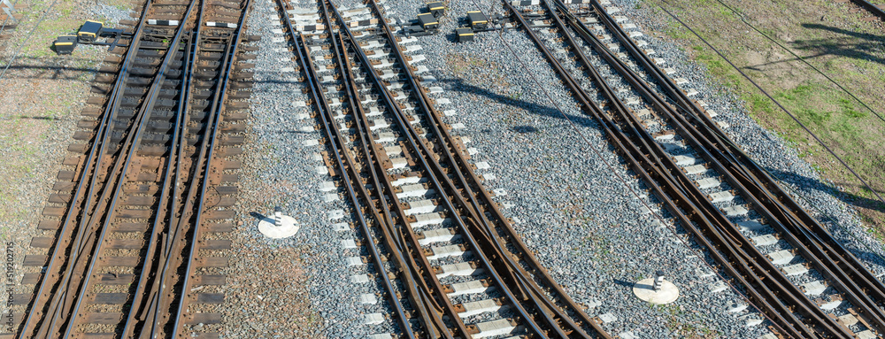 Obraz premium Top perspective view on many railway track lines. Railway, railroad track. Cargo and journey concepts.