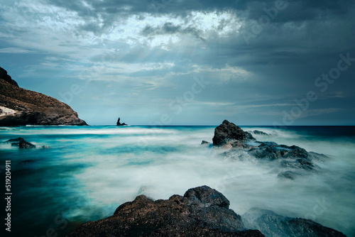Long exposure in Cala Rajá and Torre Vela Blanca in Cabo de Gata-Níjar Natural Park, Almería province, Andalusia, Spain - Cabo de gata
