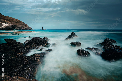 Long exposure in Cala Rajá and Torre Vela Blanca in Cabo de Gata-Níjar Natural Park, Almería province, Andalusia, Spain - Cabo de gata
