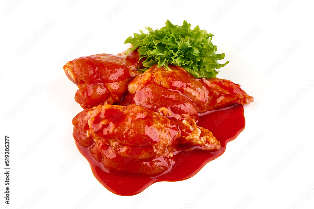 Buffalo Chicken legs in red sauce, isolated on white background. Buffalo Chicken legs in red sauce, isolated on white background.