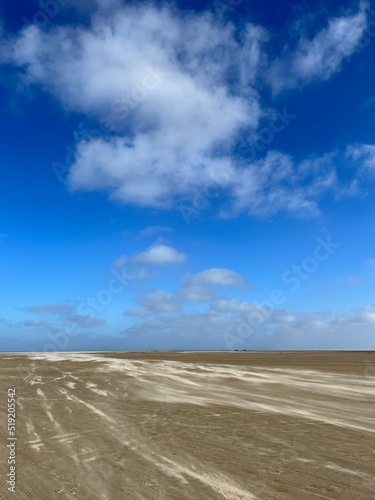 Empty sandy beach on the north sea, windy weather