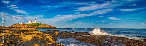 Wide Landscape view of the Nubble Lighthouse, York Beach Maine.  photo