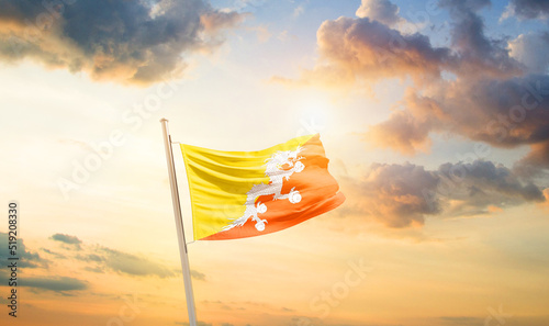 Bhutan national flag cloth fabric waving on the sky - Image