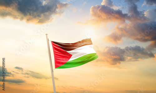 Palestine national flag cloth fabric waving on the sky - Image
