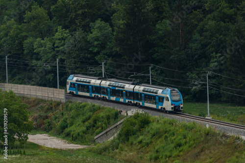Trains in deep valley of river Sava near Radovljica town in Slovenia