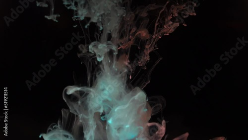 Hypnotic Ink Mix: Blue and Pink Colors Falling and Blending in Water