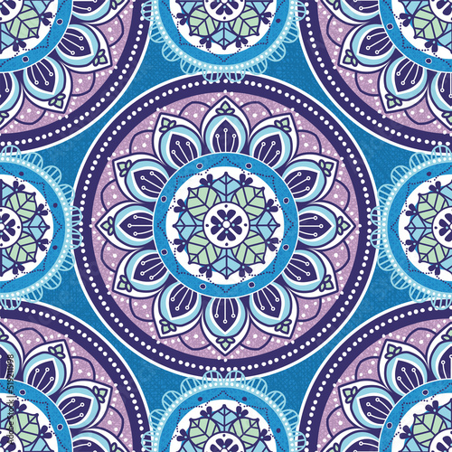 Seamless vector pattern of a brightly colored mandala. Great for teens, tweens, young women's fashion and fun.