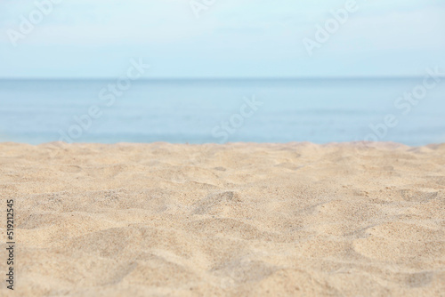 Closeup view of sandy beach near sea