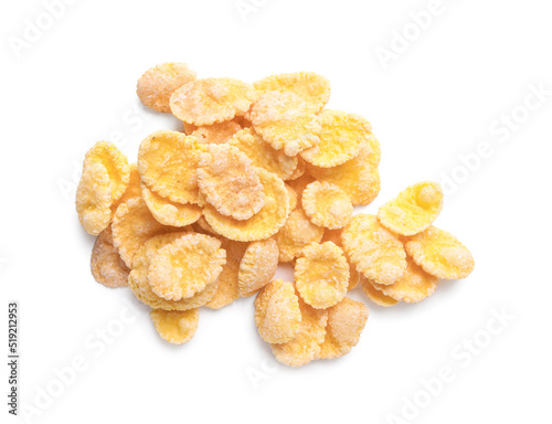 Heap of tasty crispy corn flakes isolated on white, top view