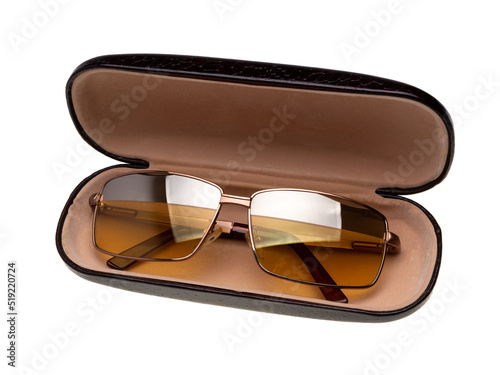 Sunglasses, elegant, luxury with split lenses, in a quality case. Isolated on white background.