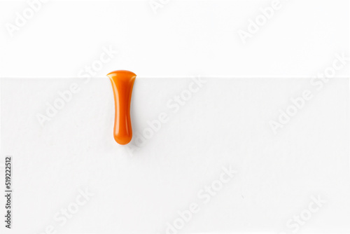 Dripping caramel drop of sweet caramel sauce isolated on white background. Melted caramel sauce drip, drop of sweet liquid toffee.