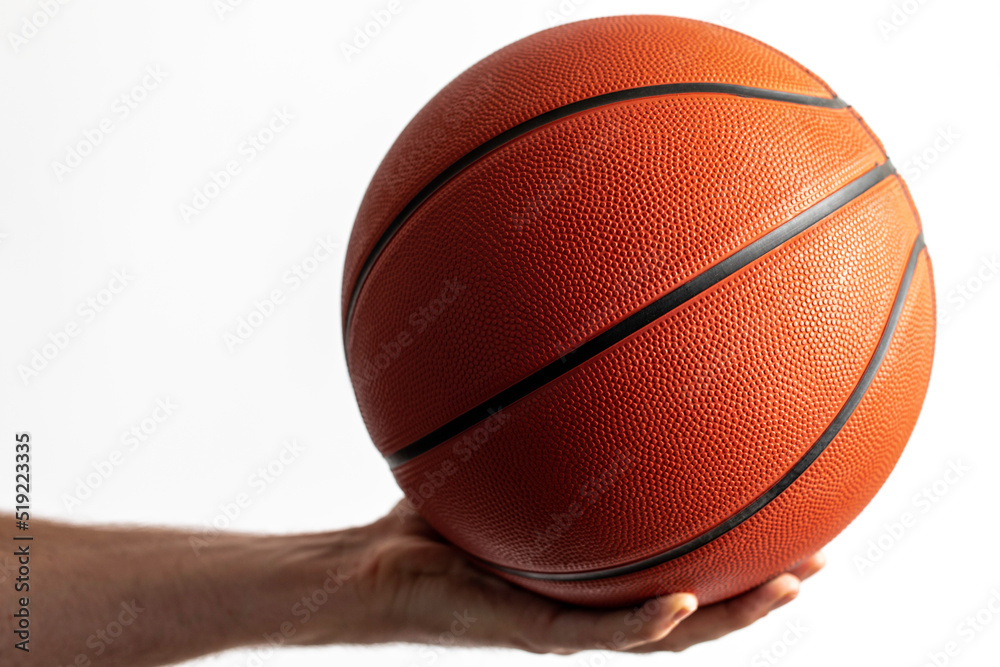 Obraz premium Holding A Basketball