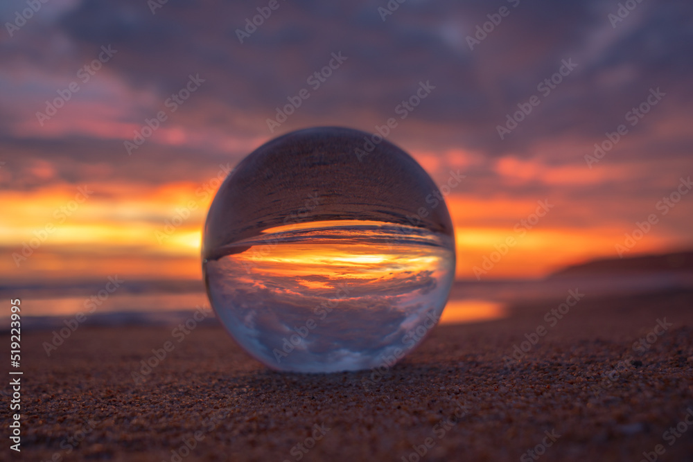 .view of beautiful sky at sunset inside crystal ball..The natural view of the sea and sky in beautiful sunset are unconventional and beautiful inside crystal ball.. .view of beautiful sky at sunset inside crystal ball..The natural view of the sea and sky in beautiful sunset are unconventional and beautiful inside crystal ball..