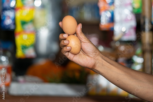 Fresh eggs in a hand  © batin